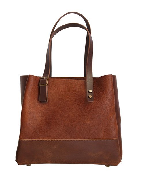 3) A structured leather tote (firm base, comfortable straps, real capacity)